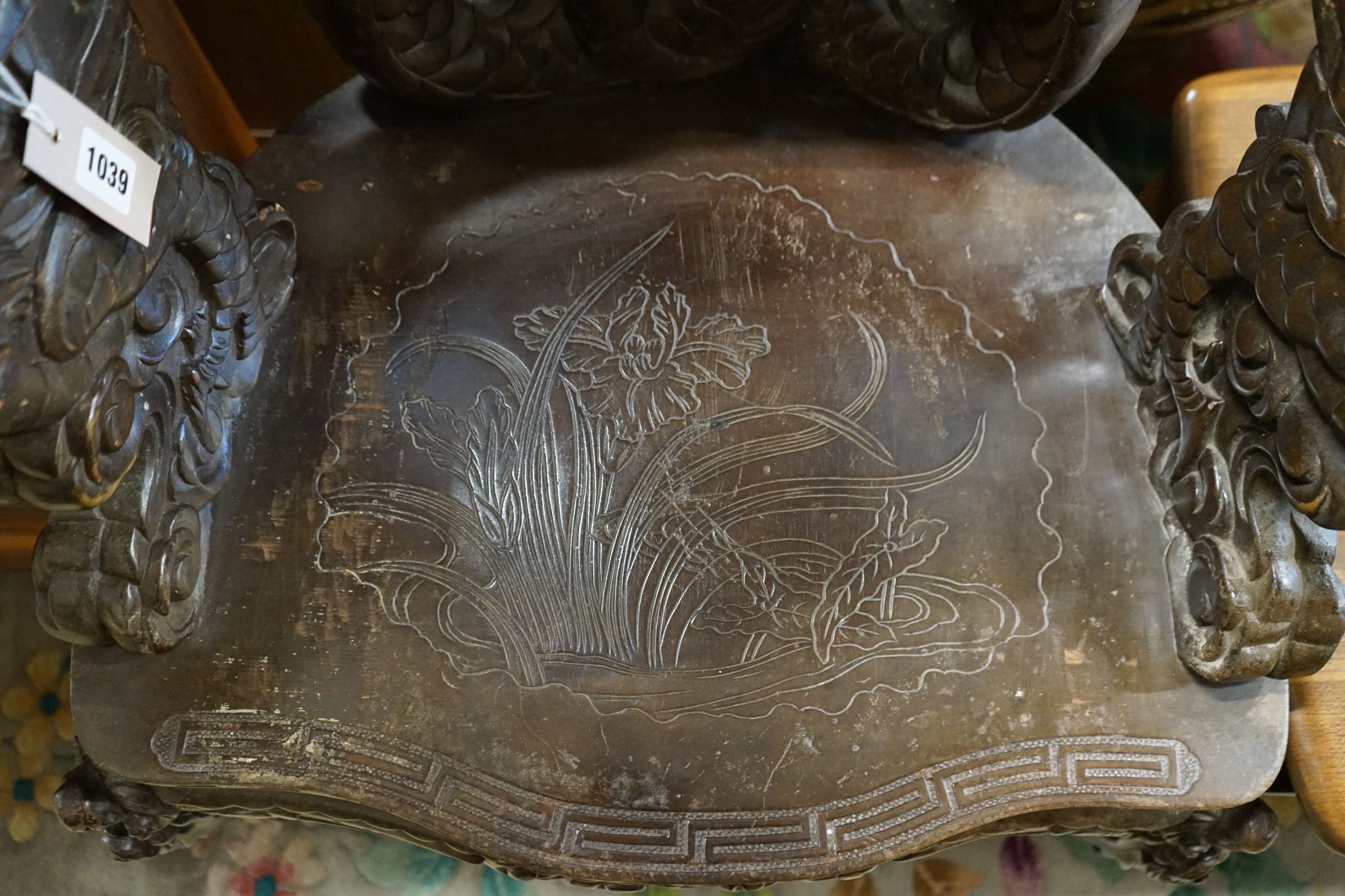 A Chinese carved hardwood 'dragon' elbow chair, width 68cm, depth 47cm, height 88cm